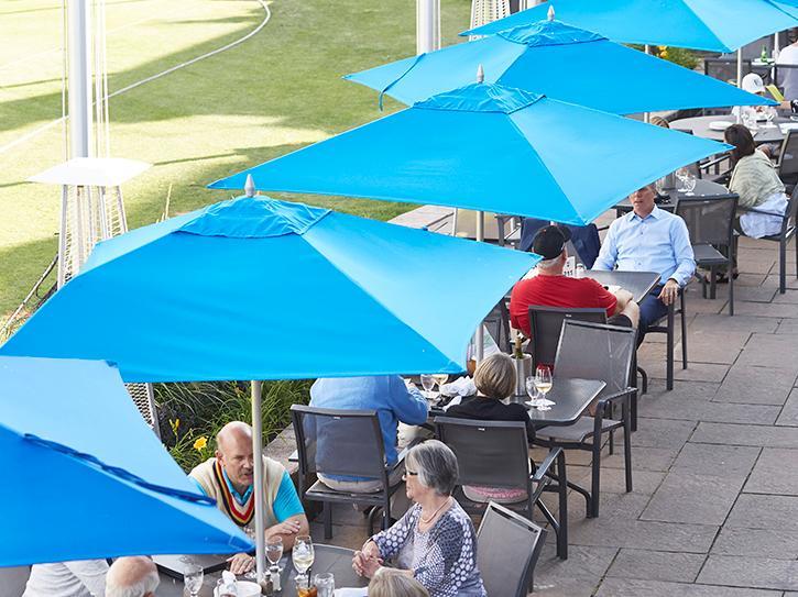 Image of members on the Cricket Club Patio